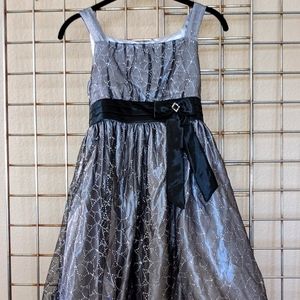 Lovely L💗VE formal girls dress.  Size 12. Black and silver/gray with sequins.